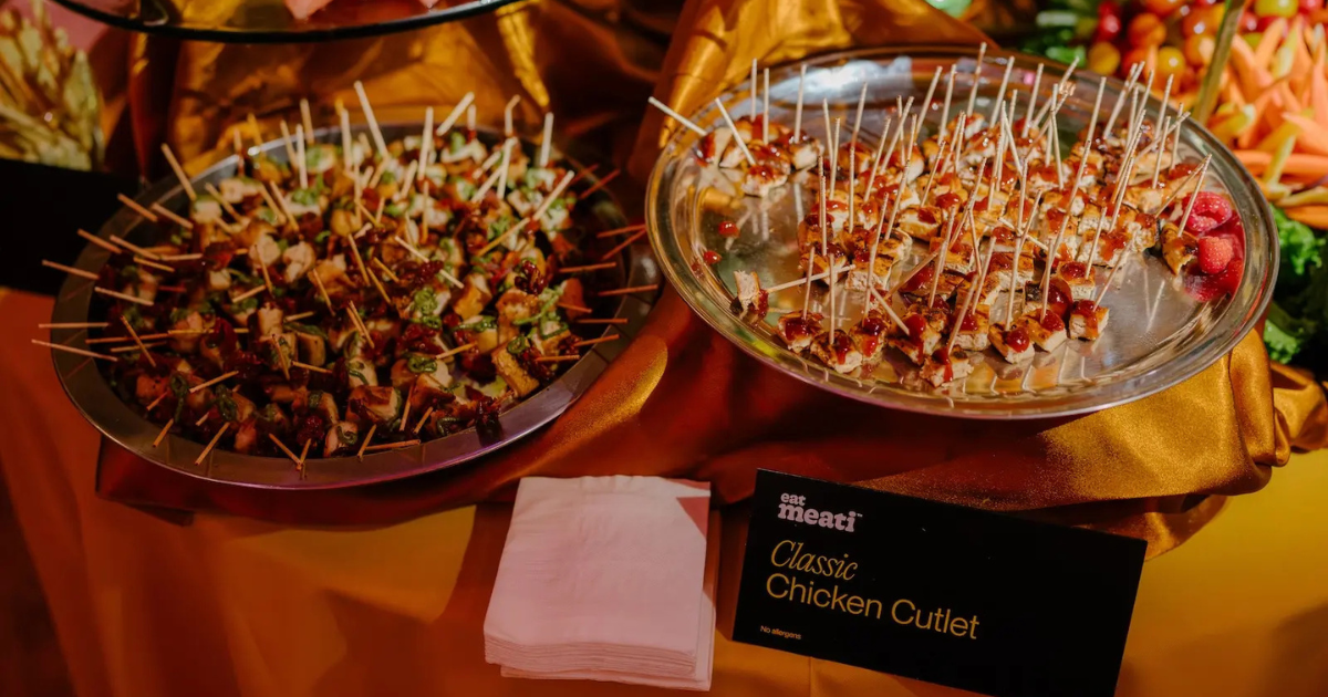 Two plates with chicken appetizers